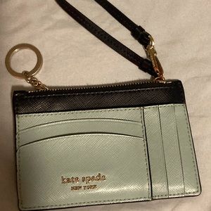 Kate Spade wristlet with card holder.